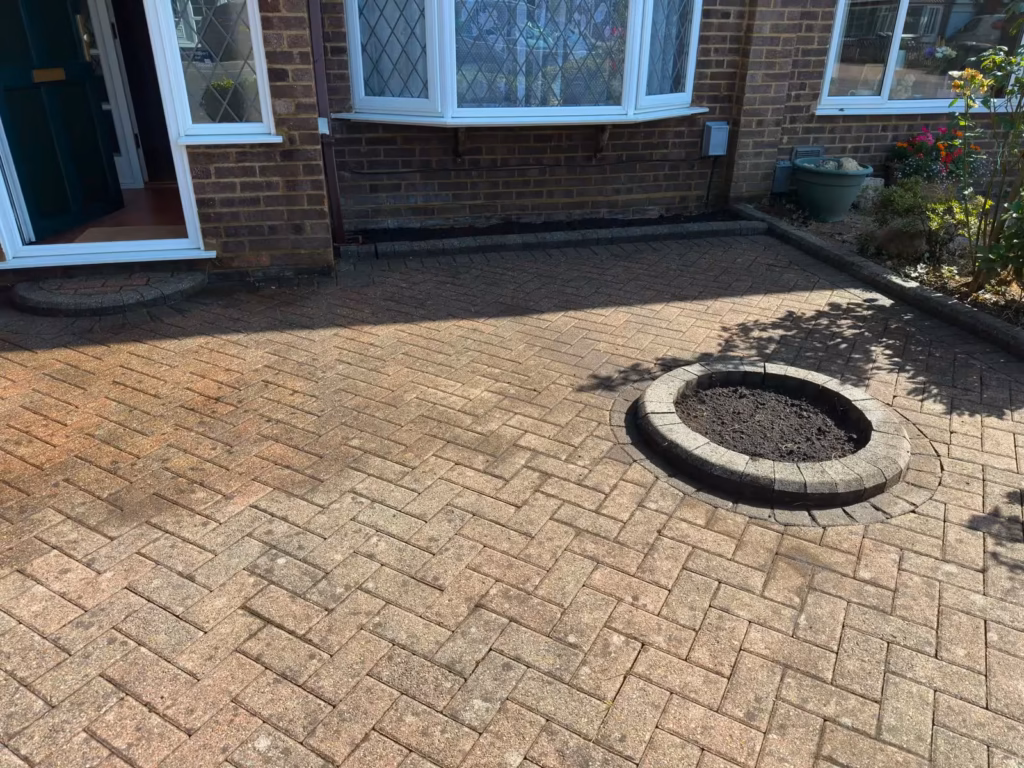 Clean block paving driveway after pressure washing in Luton