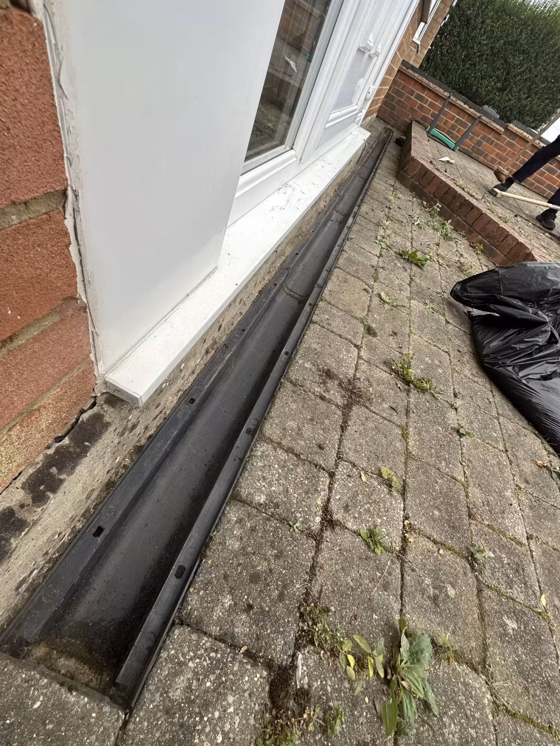 Drainage channel and block paving cleared and clean after cleaning in Luton